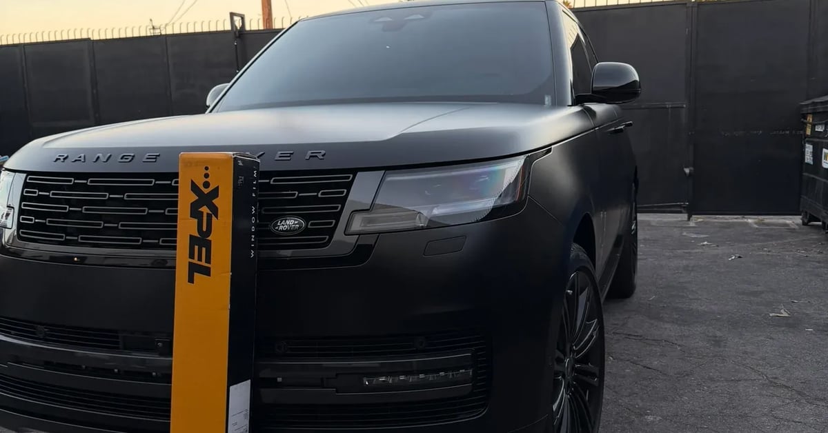 Matte black vinyl wrapped Range Rover SUV