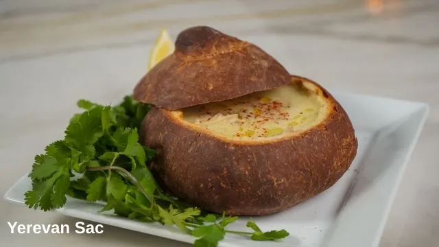 A delicious creamy soup served inside a freshly baked, hollowed-out bread bowl — Yerevan Sac, Carmichael CA