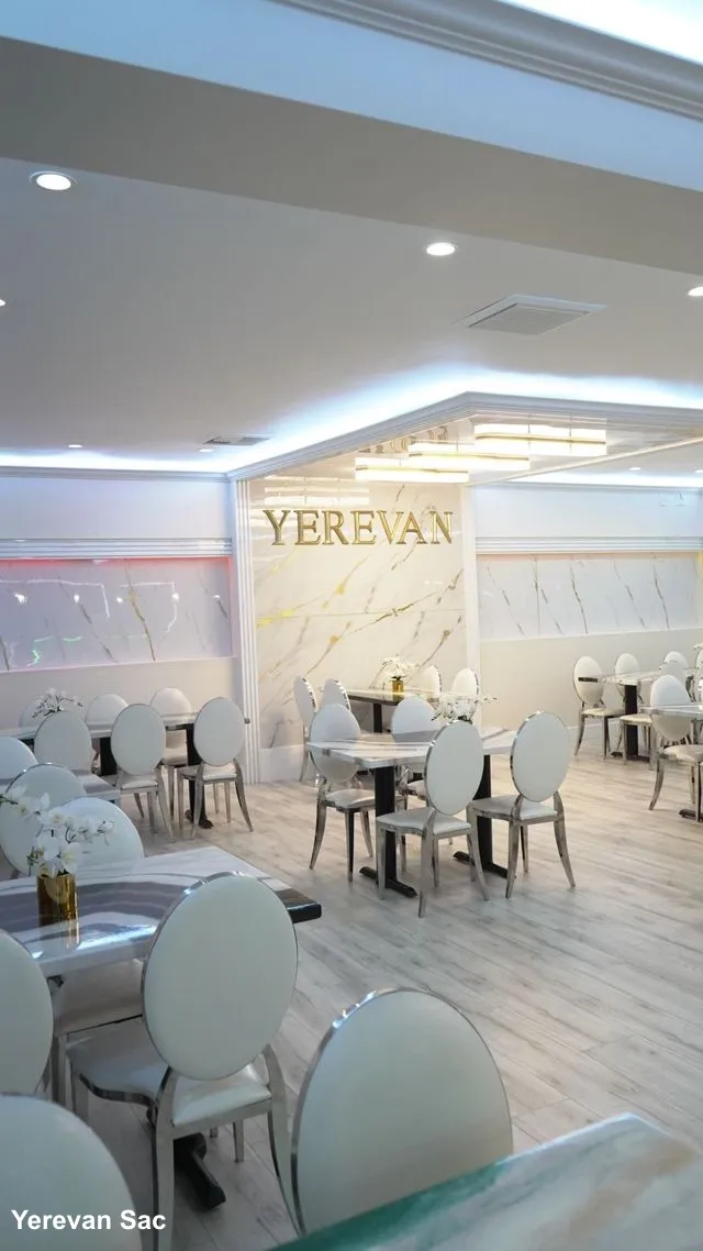 A wide-angle view of the modern and elegant dining area at Yerevan Sac