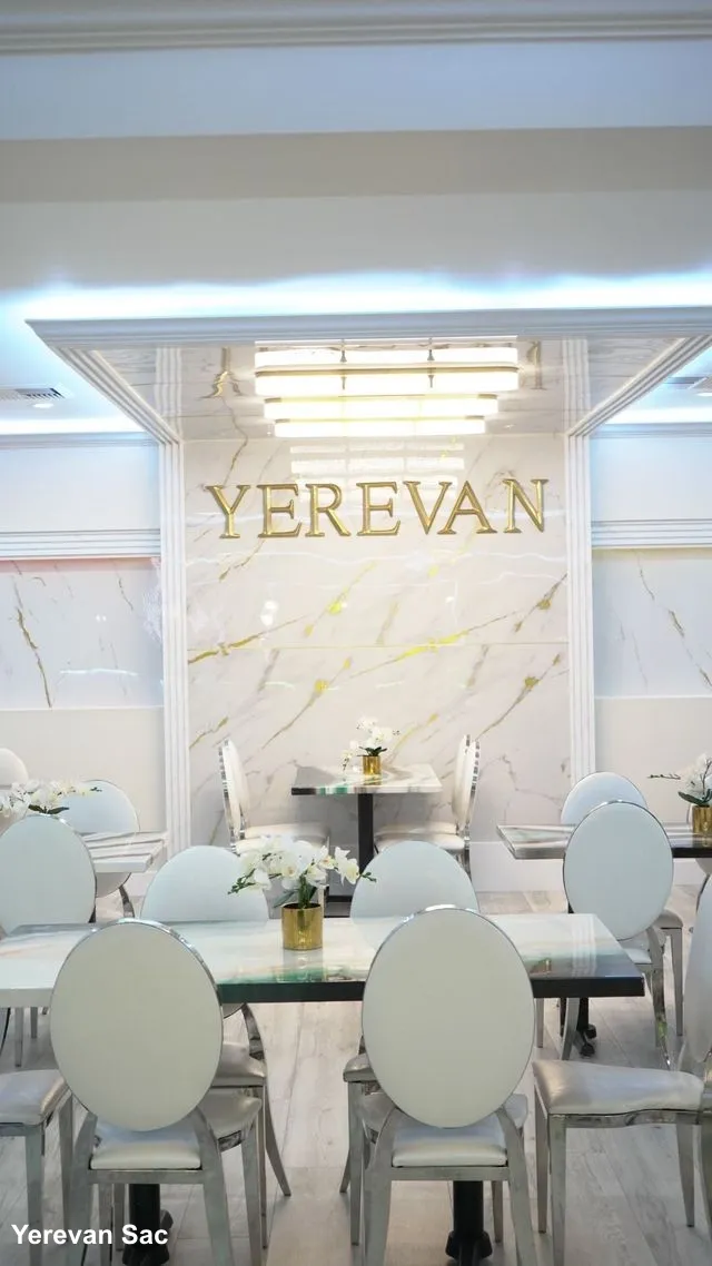 The interior of Yerevan Sac restaurant features a luxurious and bright dining area