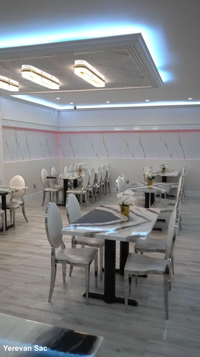 Yerevan Sac interior dining area. An inviting view of the restaurant's interior, featuring elegant decor, comfortable seating, and soft lighting, ready to welcome guests for an authentic Georgian and Armenian dining experience.