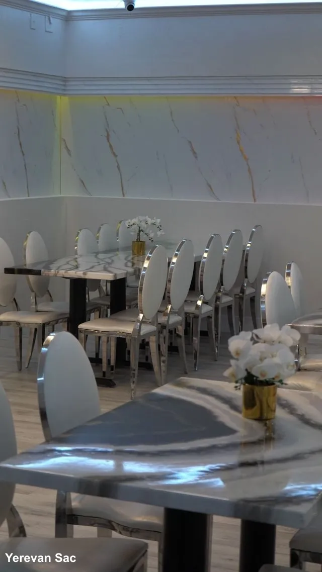 Group of people celebrating in a private dining room at Yerevan Sac